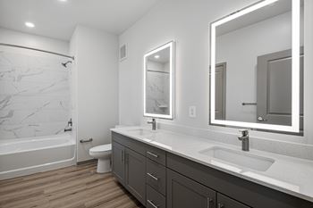 Separate showers, soaking tubs and dual vanities*